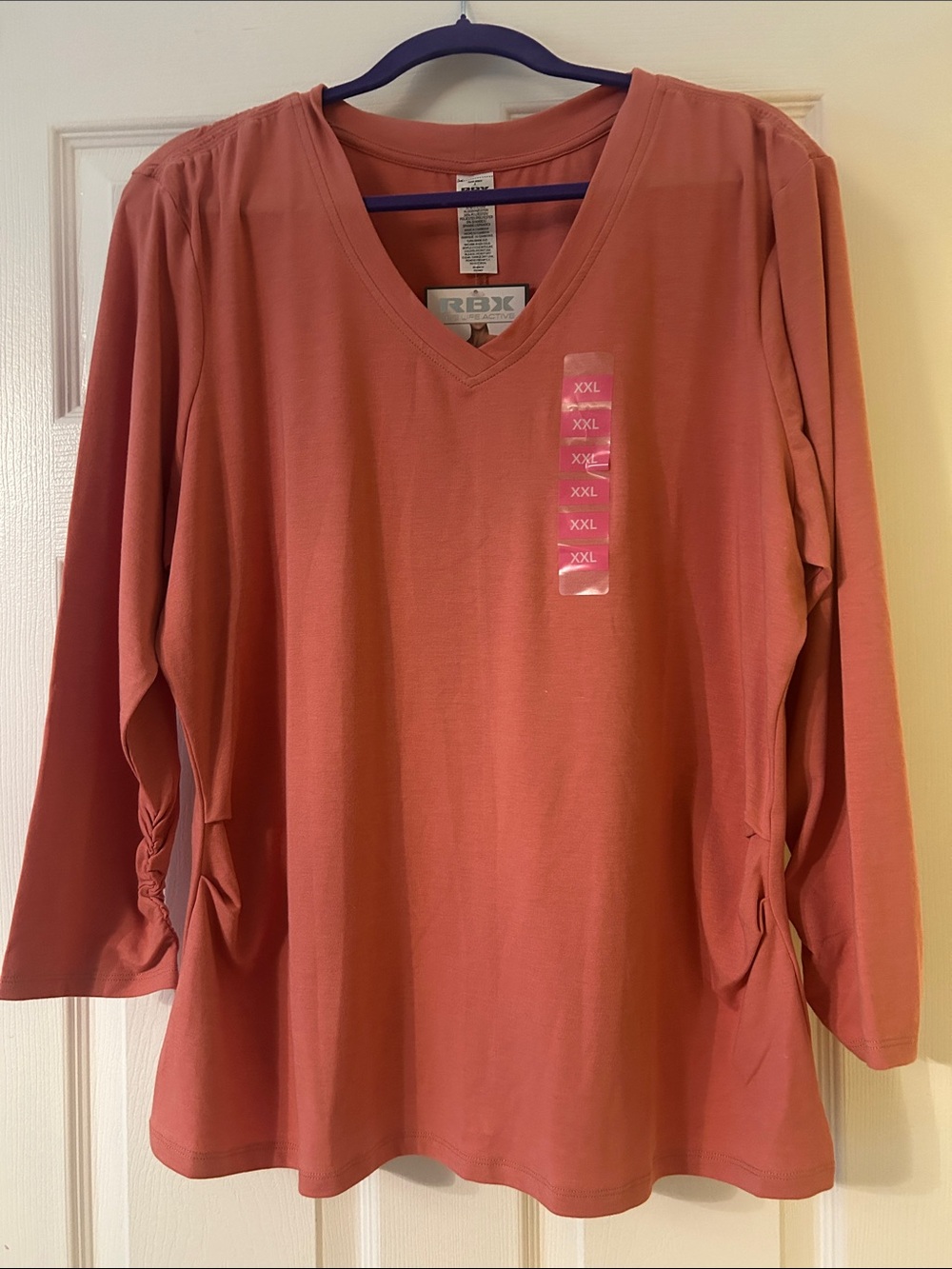 RBX Women's Long Sleeve V-Neck Top in Terracotta